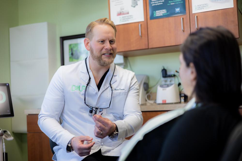 Dr. Caesar talking with woman patient, west chester oh