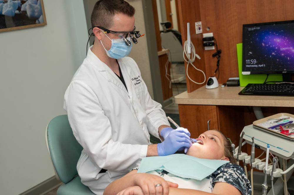 Dr. Mitchell working on a child patient, west chester oh