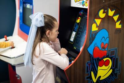 Girl playing pacman at dentistry @ university pointe, west chester oh