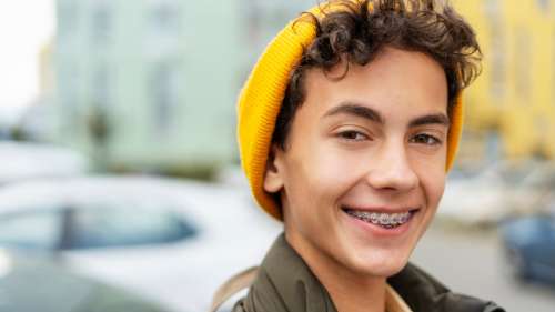 Kid with braces smiling, west chester ohio